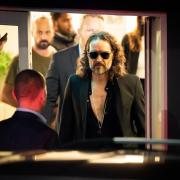 Russell Brand leaves the Troubabour Wembley Park theatre in north-west London after performing a comedy set
