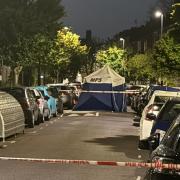 Police in Loveridge Road, Kilburn, at around 10.30pm on May 1 after a stabbing that afternoon