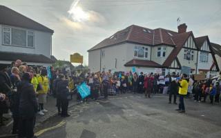 Campaigners outside Byron Court Primary School in March