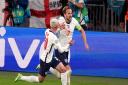 England's Harry Kane celebrates scoring their side's second goal of the game with Phil Foden during the UEFA Euro 2020 semi final match at Wembley Stadium, London. Picture date: Wednesday July 7, 2021.