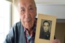 Geoffrey Janes (90) with a photograph of himself in uniform in 1946, when he was Sgt Janes of the Royal Army Ordinace Corps.