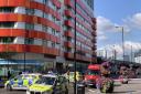 Police at the scene of the stabbing in Barking Road. Picture: Twitter/NewhamMPS