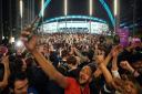 England fans celebrate outside Wembley Stadium after England beat Denmark to make it into the Euro 2020 final against Italy.