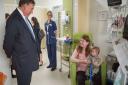 Noah's family meeting Lord Fink, who officially opened the ward last week.