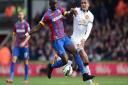 Crystal Palace's Yannick Bolasie (left) battles for the ball with Manchester United's Chris Smalling at Selhurst Park.