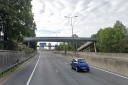 Police closed a section of the M1 after the brother of a man about to be returned to Albania threatened “self-harm” on a motorway bridge on the M1 at Staples Corner