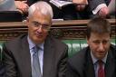 Chancellor Alistair Darling (centre) is flanked by Prime Minister Gordon Brown and International Development Secretary Douglas Alexander (right) during Prime Minister’s Questions in the House of Commons, London.