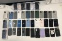 The stolen phones retrieved after a raid in Harlesden