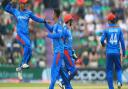 Afghanistan's Mujeeb Ur Rahman (centre) celebrates taking the wicket of Bangladesh's Soumya Sarkar during the ICC Cricket World Cup group stage match at The Hampshire Bowl, Southampton.