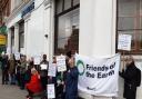 Brent Friends of the Earth staged a protest outside Barclay's Bank in Cricklewood