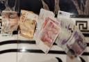 Cash found in the UK after dawn raid in Kingsbury discovered trafficked Romanian nationals