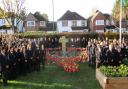 Pupils from St Gregory�s Catholic Science College plant poppies in their school's remembrance garden. Picture: Gail Hovey