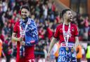 Rob Hunt and Paul Smyth celebrate Leyton Orient's League Two title win