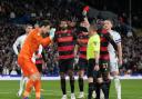 QPR goalkeeper Asmir Begovic is shown a red card at Leeds