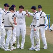 Middlesex's Ethan Bamber (facing) celebrates with his team mates the wicket of Somerset's Tom Abell during the LV= Insurance County Championship match at Lord's Cricket Ground, London. Picture date: Sunday April 11, 2021.