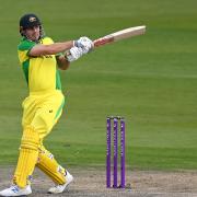 Australia's Mitchell Marsh strikes the ball during the first Royal London ODI match at Emirates Old Trafford, Manchester.