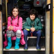 Alessandra & Santiago, children of one of the Zen Project instructors, aboard the bus at the Bigfoot festival in the summer of 2021