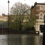 Cambridge Gardens in Kilburn under water after downpour on July 12
