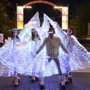 Roller-skaters perform at the Winterfest Christmas light Switch-On event at Wembley Park