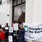 Brent Friends of the Earth staged a protest outside Barclay's Bank in Cricklewood
