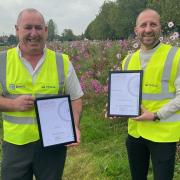 Veolia's Malcolm Edmunds, contract manager for grounds maintenance and Paul Bond, environment manager, after Brent wins big at London in Bloom
