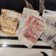 Cash found in the UK after dawn raid in Kingsbury discovered trafficked Romanian nationals