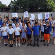 Maloree Junior and Infant school pupils wish Tom Dean good luck in the Tokyo Olympics