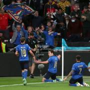 Italy's Federico Chiesa (centre) celebrates scoring their side's first goal of the game during the UEFA Euro 2020 semi final match at Wembley Stadium, London. Picture date: Tuesday July 6, 2021.