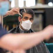 Rishi Sunak MP enjoys a hair cut at Chop Chop London, Wembley Park