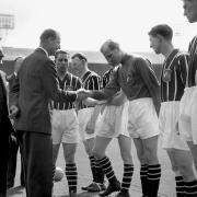 File photo dated 05/05/56 of The Duke of Edinburgh shaking hands with Manchester City's Footballer of the Year Bert Trautmann, before the FA Cup final at Wembley in London in 1956.