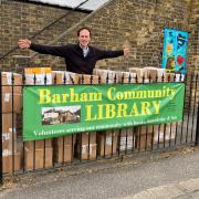Paul Lorber, of Friends of Barham Community Library, with 60 boxes of books donated by Usborne publishers