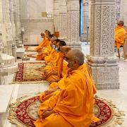 Swamis at Neasden Temple observe a minute of silence on the first Covid lockdown anniversary