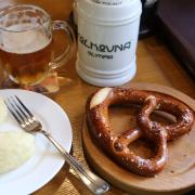 Enjoy a foaming beer and a pretzel for Oktoberfest