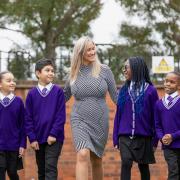 Leopold Primary School head Rachel Mollett with year-six students