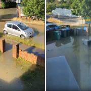 Footage shows a road near Preston Road flooded from a burst main