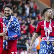 Rob Hunt and Paul Smyth celebrate Leyton Orient's League Two title win