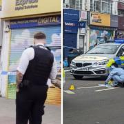 Police at the scene of a stabbing in Kilburn High Road