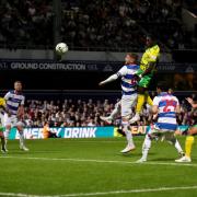 Jonathan Rowe heads a late winner for Norwich at QPR