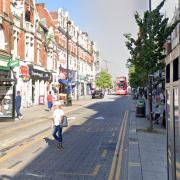 A woman was racially abused on a bus in Harlesden, witnesses said