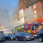 A cordon is in place in Bridge Road as firefighters tackle the blaze