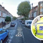 A man has been arrested on suspicion of murder after a woman, 80, was found dead in a home