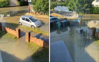 Footage shows a road near Preston Road flooded from a burst main